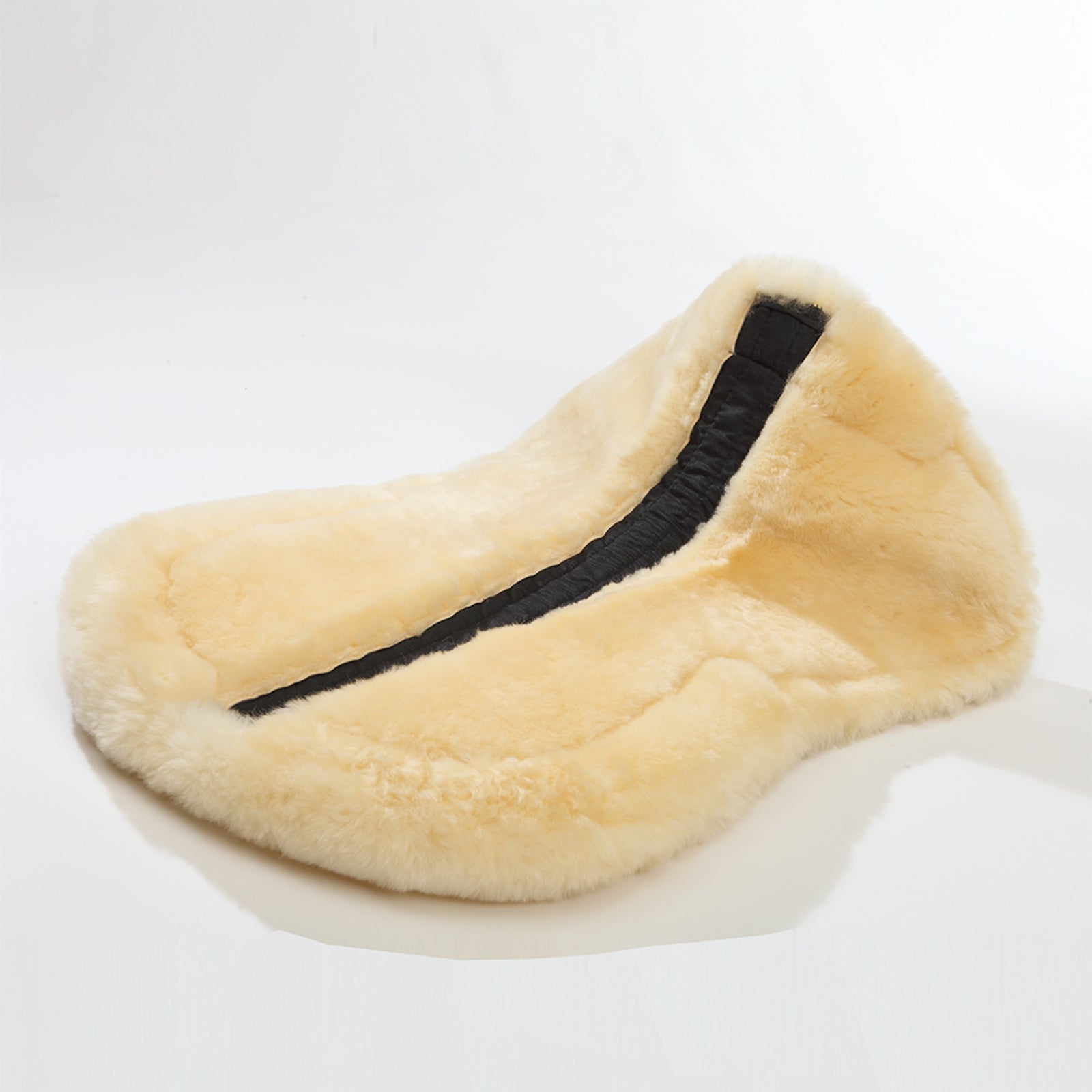 Kavalkade Lambswool pad w/ brim behind, lambswool Saddle Pads